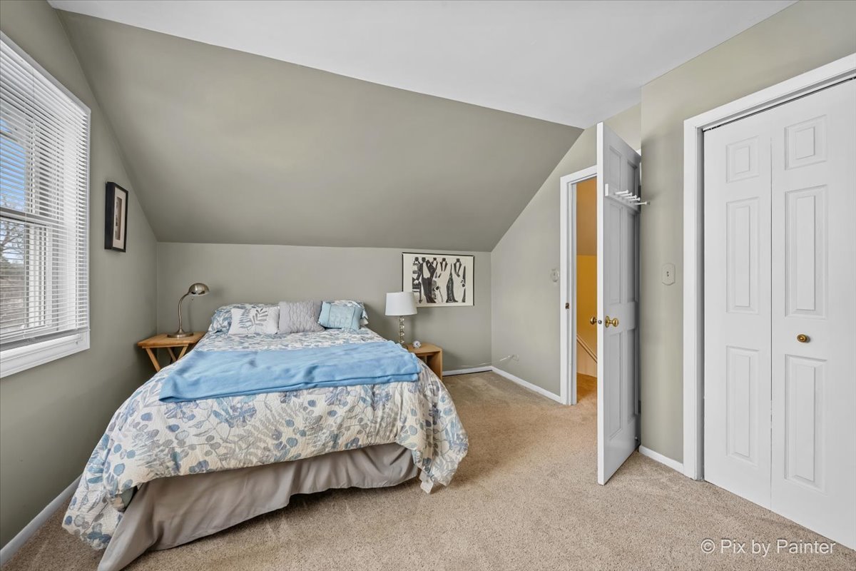 11N575 Rohrssen Road Elgin, IL 60120 - Photo 31 of 58 a bedroom with a bed and a cabinets