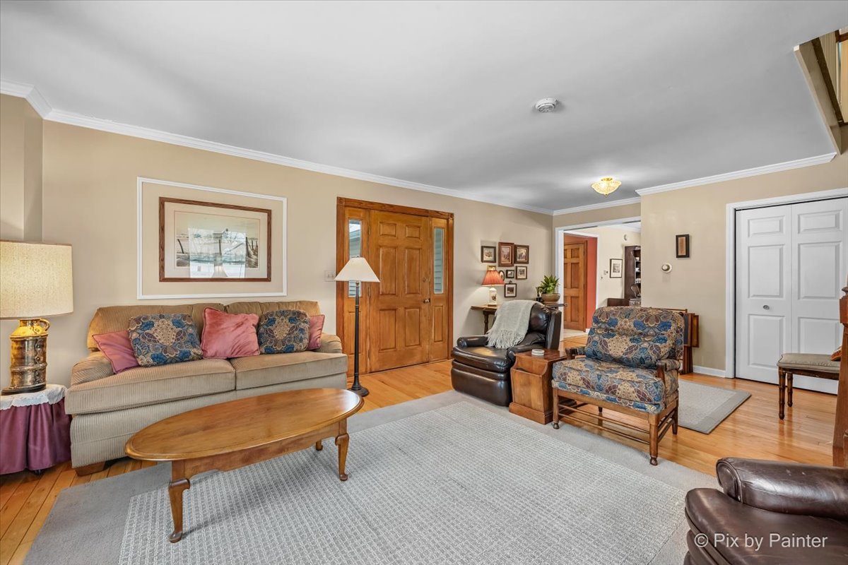 11N575 Rohrssen Road Elgin, IL 60120 - Photo 7 of 58 a living room with furniture and a window