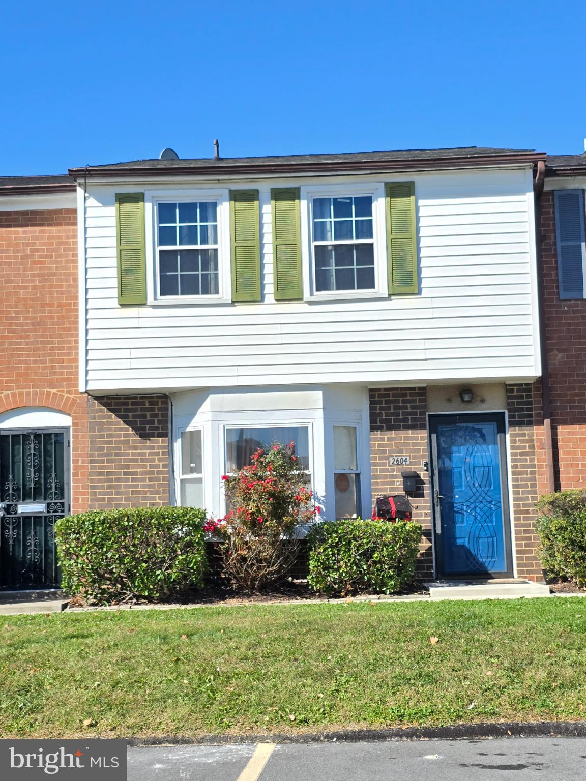 2604 Molton Way, Unit 2604 Windsor Mill, MD 21244 - Photo 1 of 14 Charming townhouse with vibrant shutters.