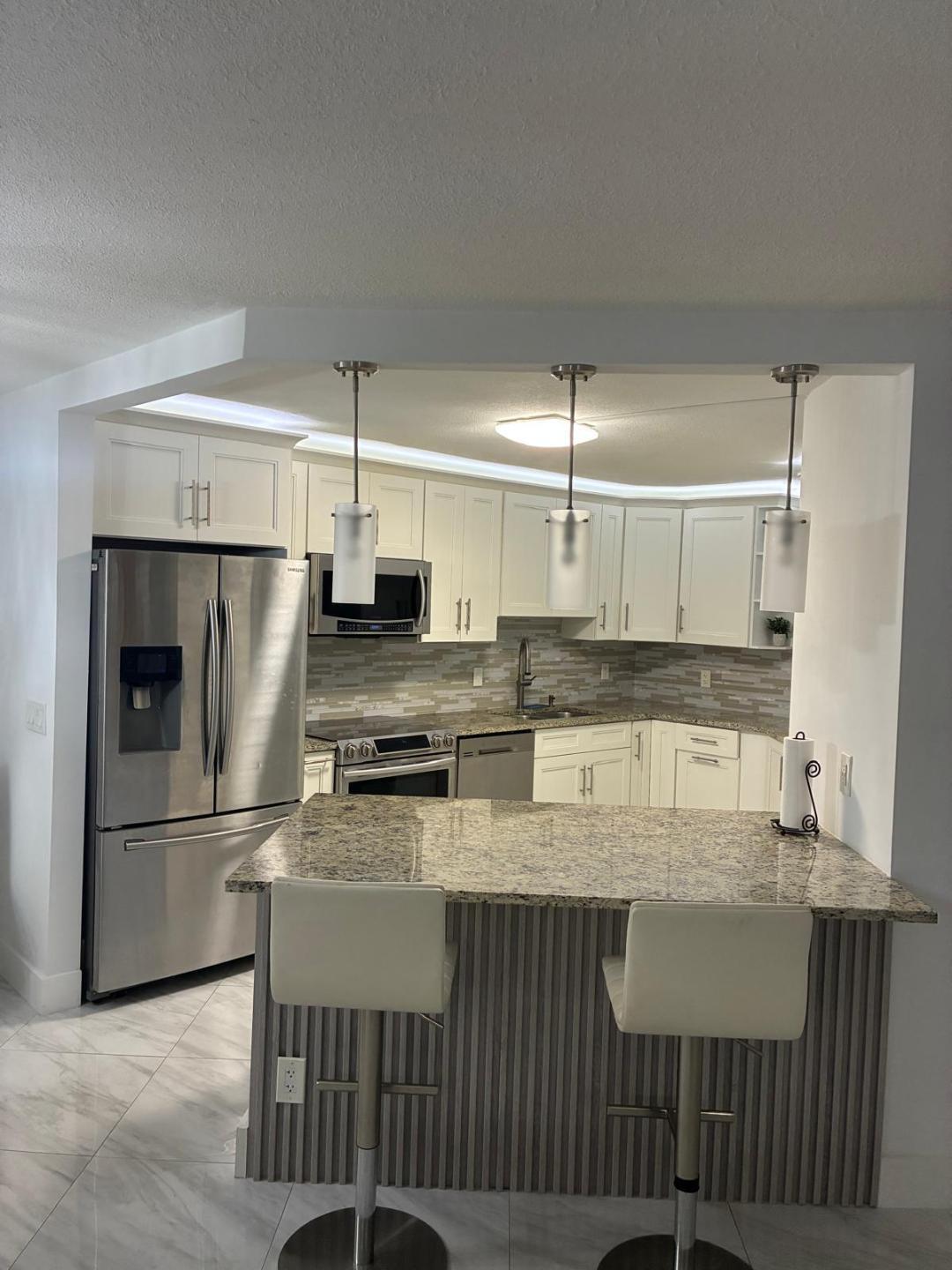 5749 Camino Del Sol, Unit 202 Boca Raton, FL 33433 - Photo 14 of 39 Kitchen