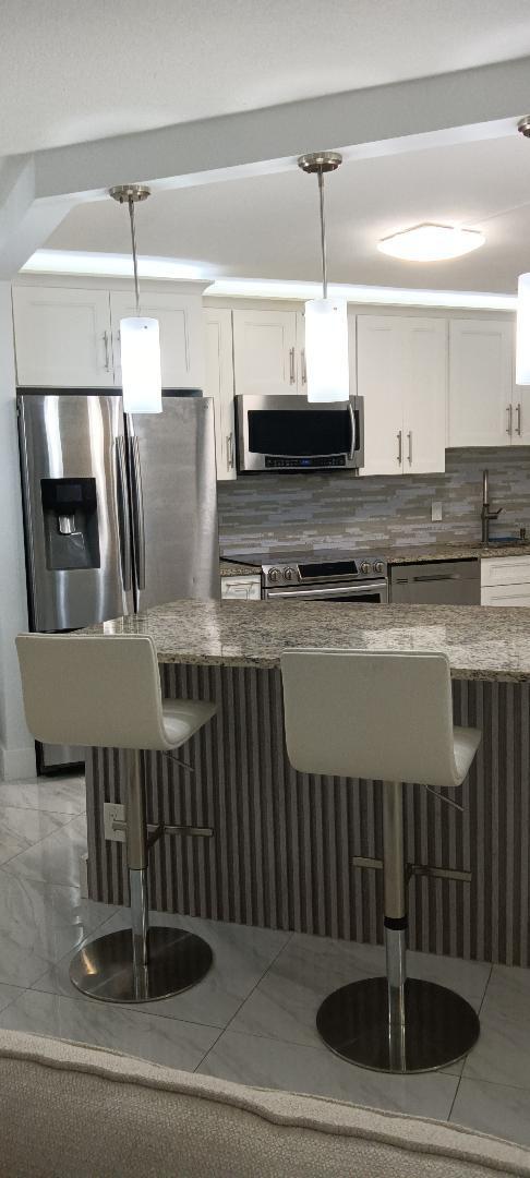 5749 Camino Del Sol, Unit 202 Boca Raton, FL 33433 - Photo 17 of 39 Open Concept