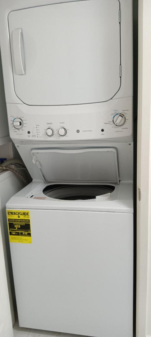 5749 Camino Del Sol, Unit 202 Boca Raton, FL 33433 - Photo 27 of 39 a utility room with washer and dryer