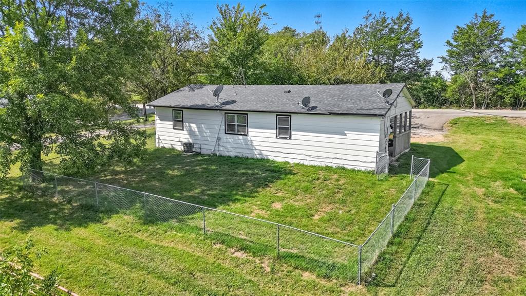 1166 North Business Highway 78 Blue Ridge, TX 75424 - Photo 16 of 18 Rear view of house with a shingled roof