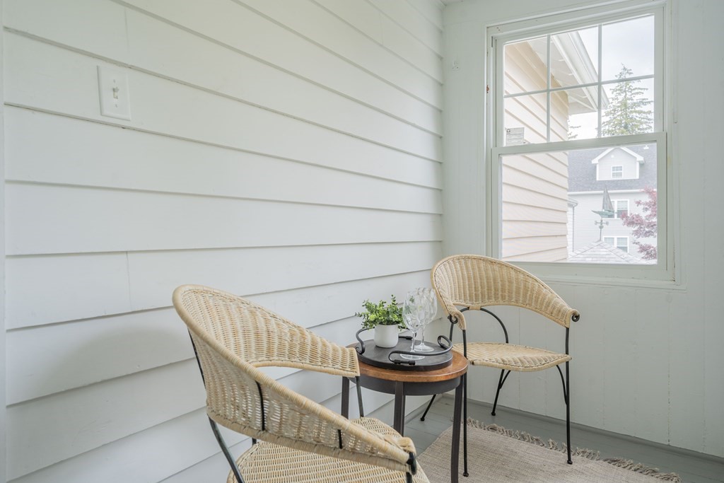 7 Maynard Street, Unit 2 Arlington, MA 02474 - Photo 21 of 42 a view of a dining room with furniture and window