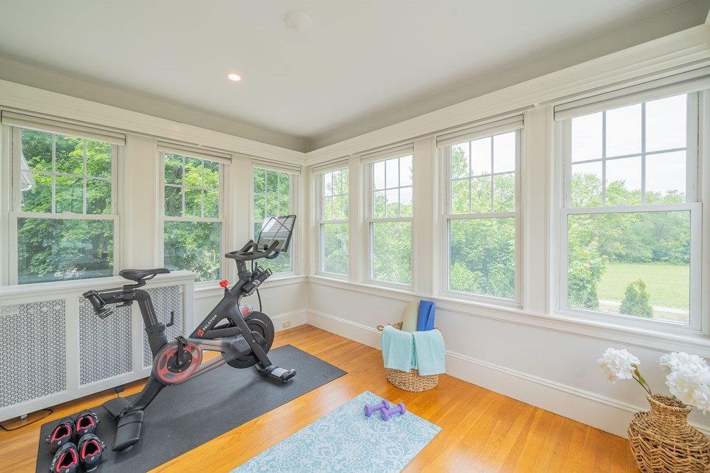 7 Maynard Street, Unit 2 Arlington, MA 02474 - Photo 8 of 42 a view of a room with gym equipment