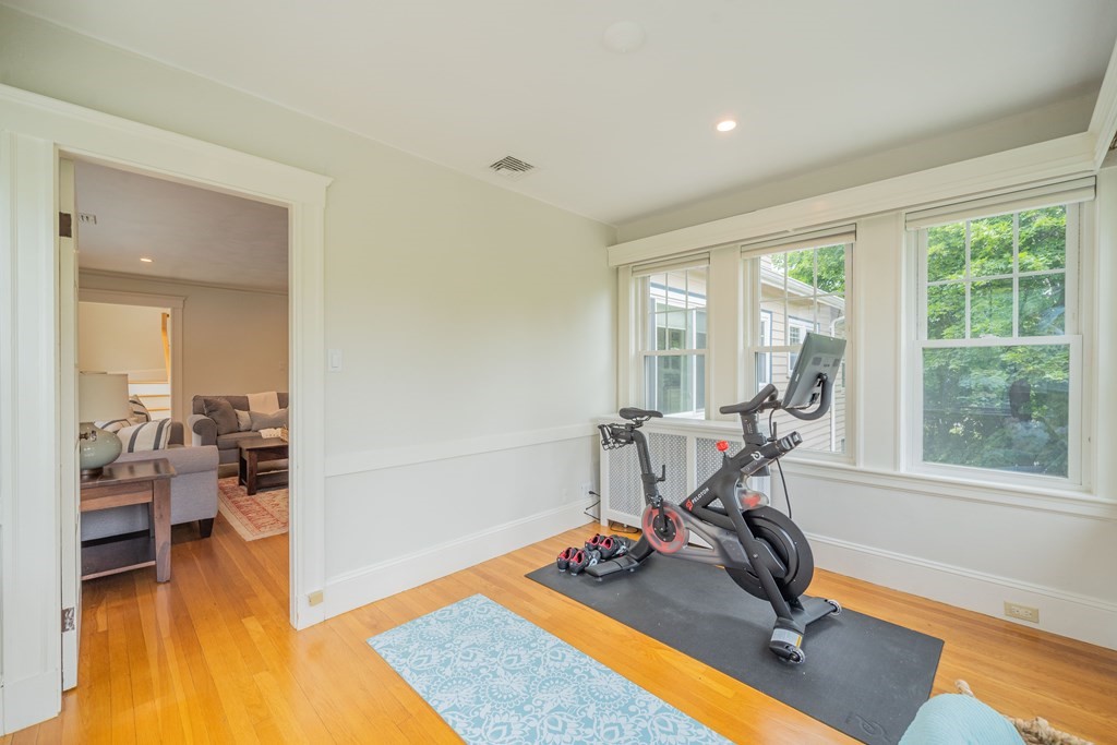 7 Maynard Street, Unit 2 Arlington, MA 02474 - Photo 9 of 42 a view of a room with gym equipment