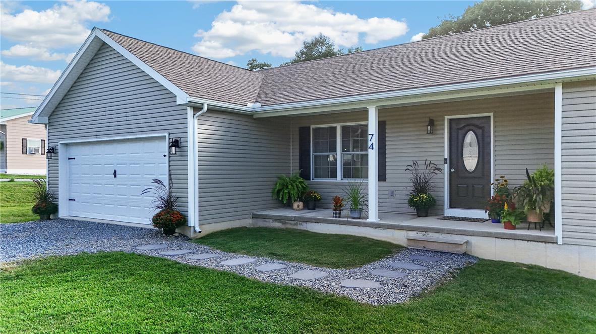 74 Kepners Road New Ringgold, PA 17960 - Photo 61 of 79 Crisp vinyl siding and a welcoming front porch establish classic curb appeal for this ranch-style home.