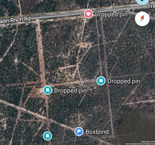 a view of a outdoor space with a table and chairs