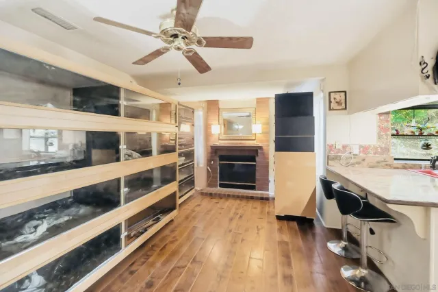 a kitchen with stainless steel appliances a stove and cabinets