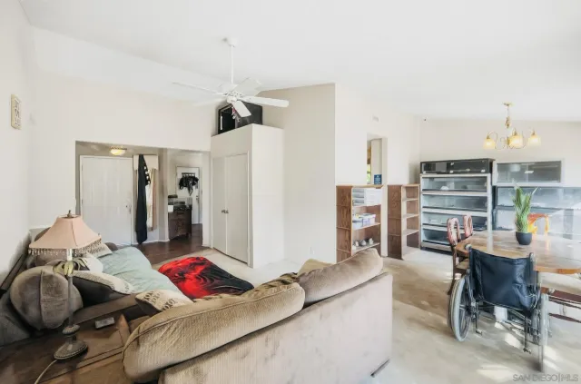 a view of a chairs and table in a patio