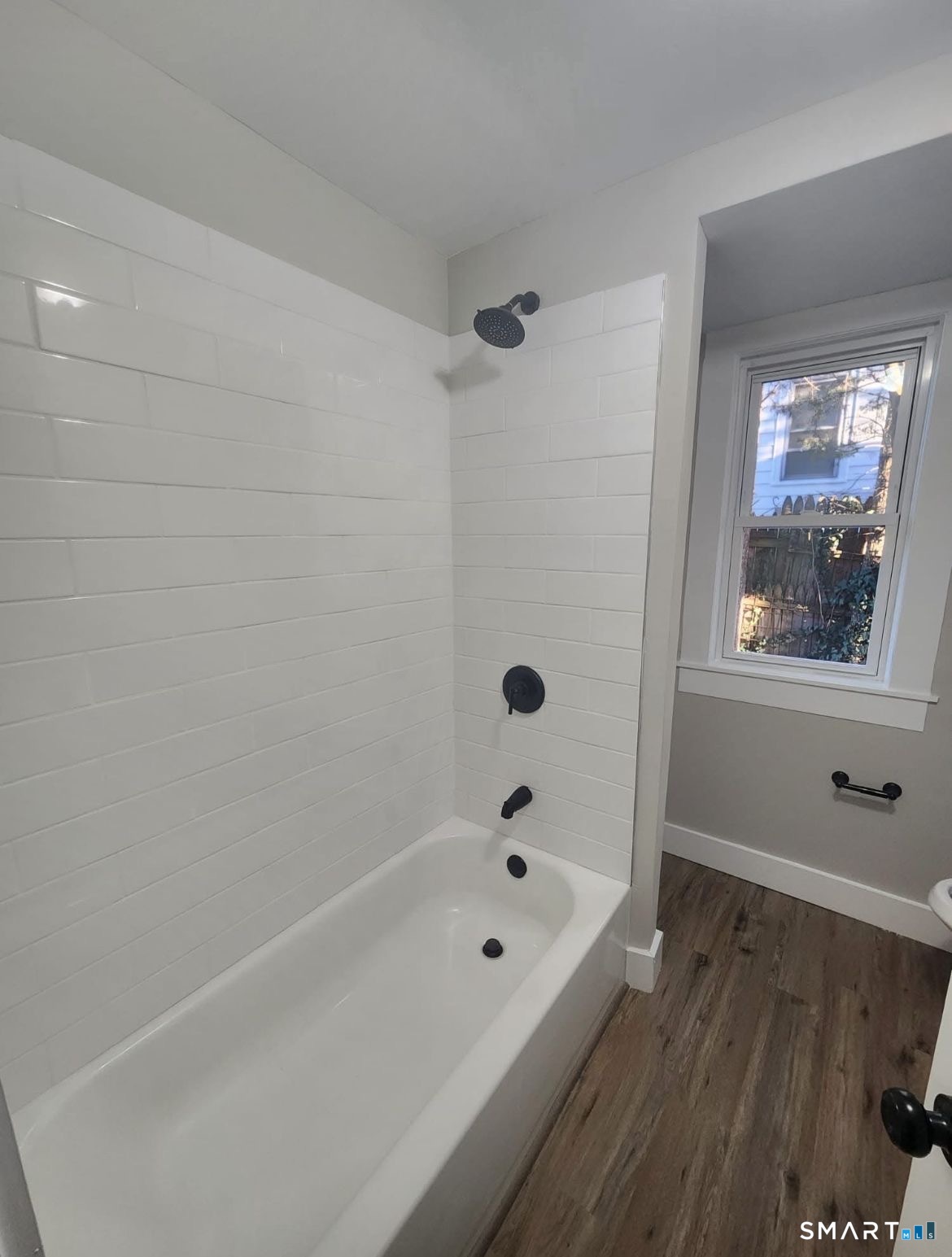 282 Ward Street Wallingford, CT 06492 - Photo 5 of 6 a bathroom with a bathtub and shower