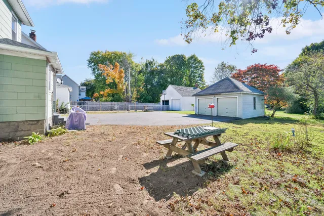 a house view with a backyard space