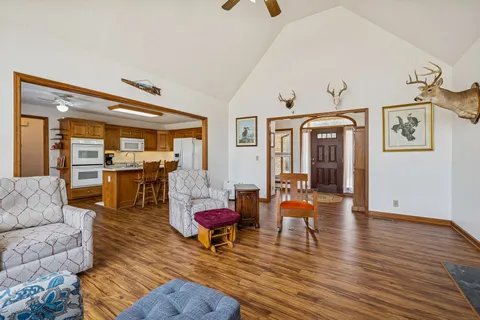 a living room with furniture fireplace and flat screen tv
