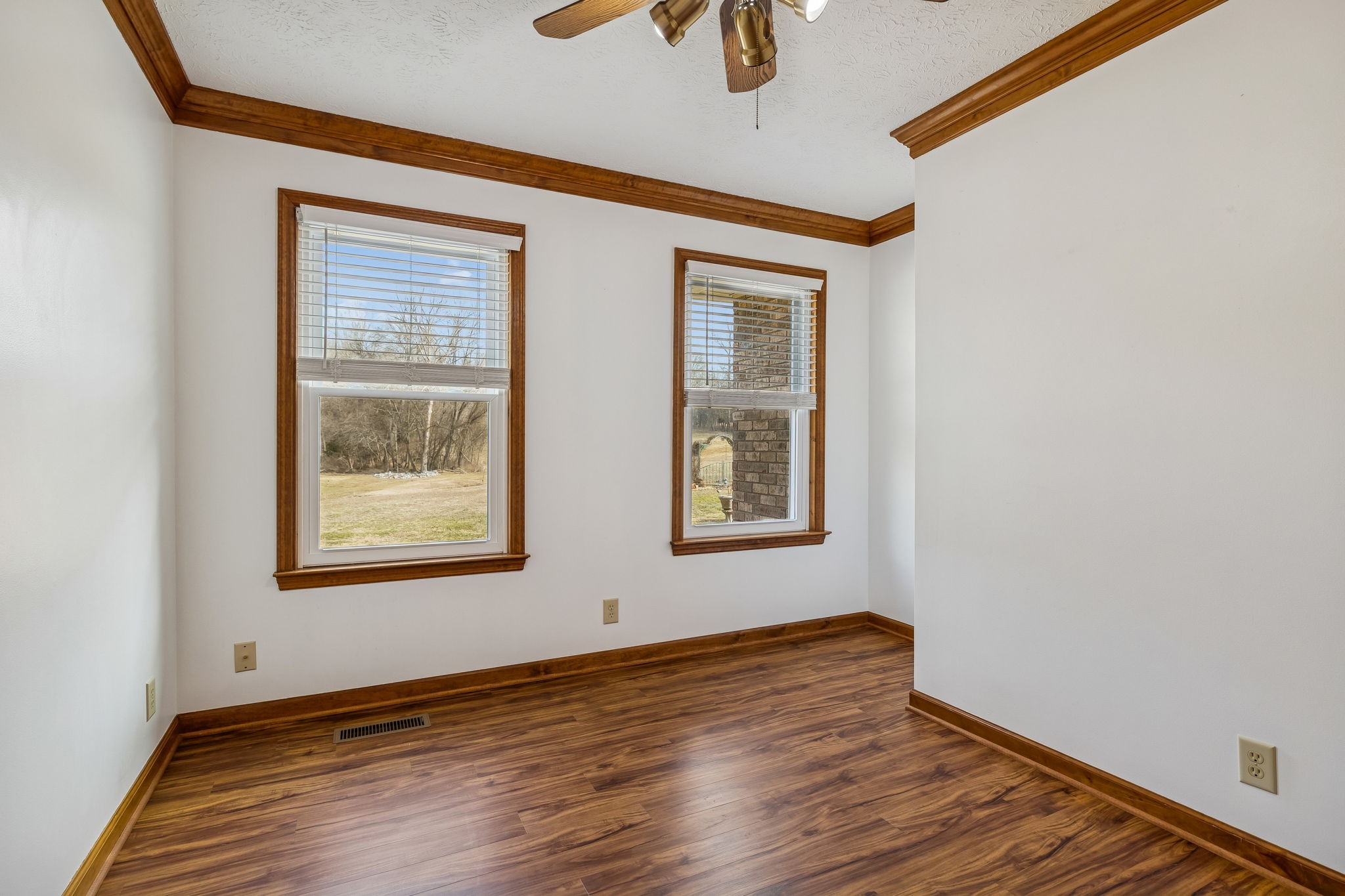 1457 Absher Branch Road Westmoreland, TN 37186 - Photo 32 of 74 a view of an empty room with wooden floor and a window