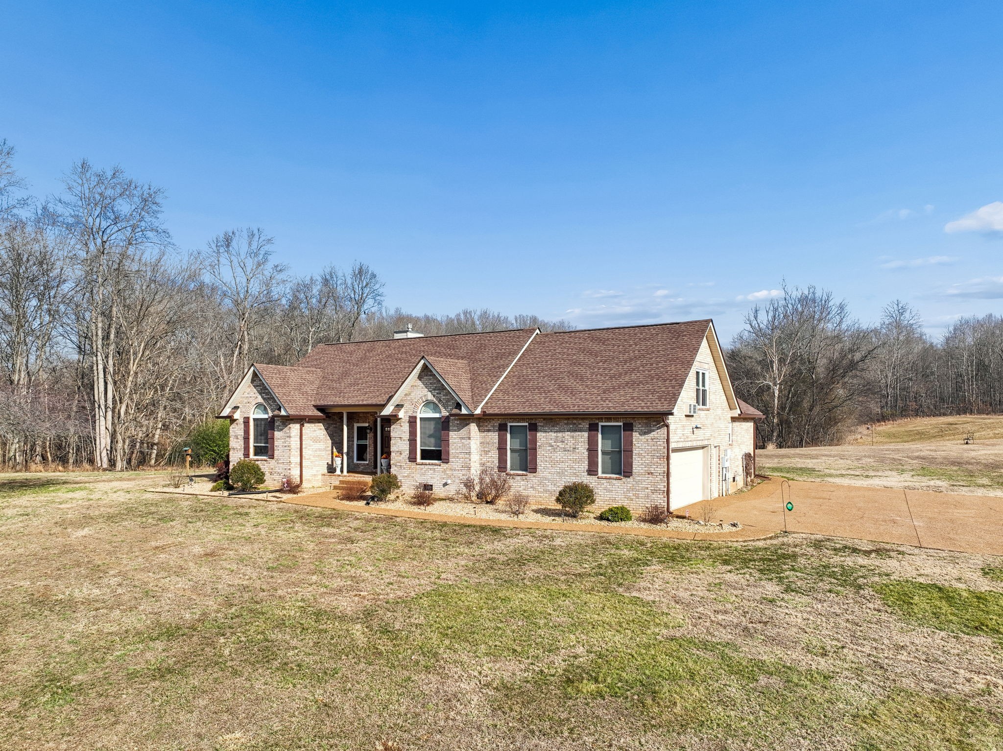 1457 Absher Branch Road Westmoreland, TN 37186 - Photo 5 of 74 a front view of a house with a yard
