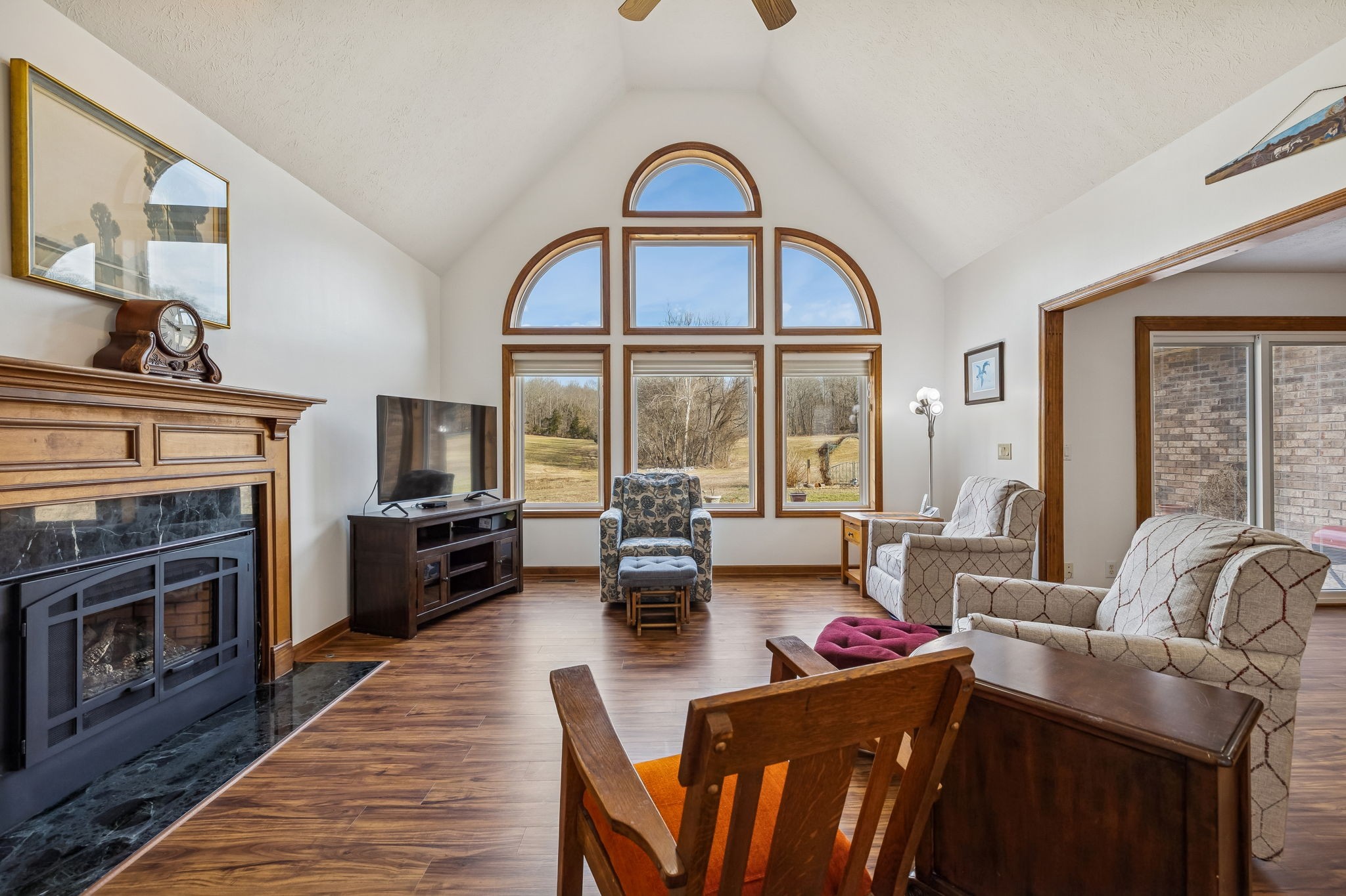 1457 Absher Branch Road Westmoreland, TN 37186 - Photo 9 of 74 a living room with furniture fireplace and flat screen tv