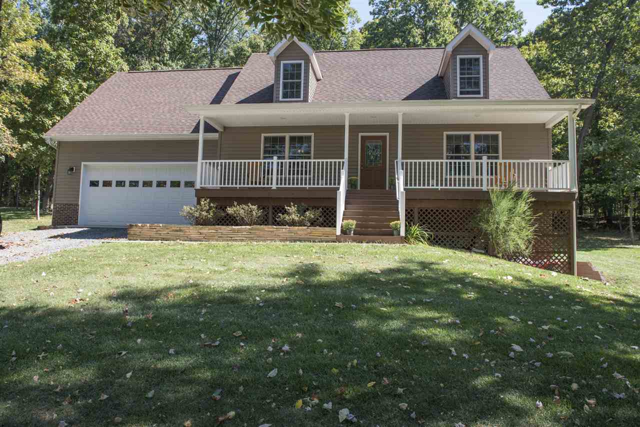 5979 Faughts Road Mount Crawford, VA 22841 - Photo 1 of 18 a front view of a house with garden