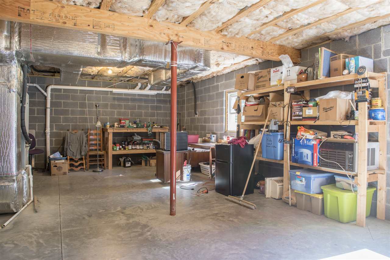 5979 Faughts Road Mount Crawford, VA 22841 - Photo 12 of 18 a view of store room with racks