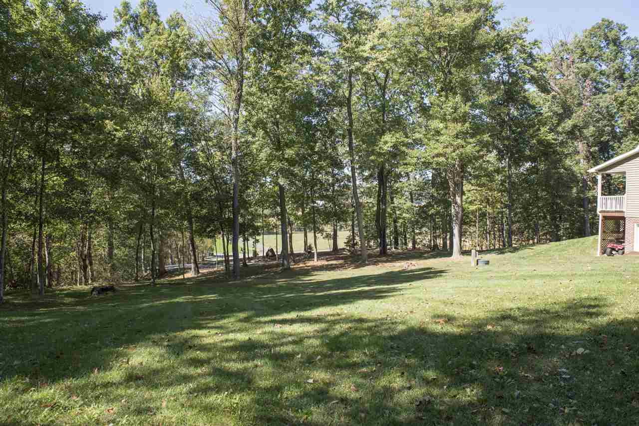 5979 Faughts Road Mount Crawford, VA 22841 - Photo 13 of 18 a backyard of apartments with large trees