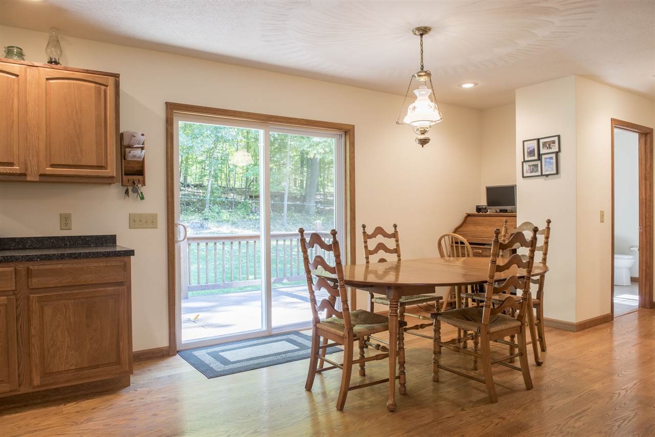 5979 Faughts Road Mount Crawford, VA 22841 - Photo 4 of 18 a dining room with furniture window and wooden floor