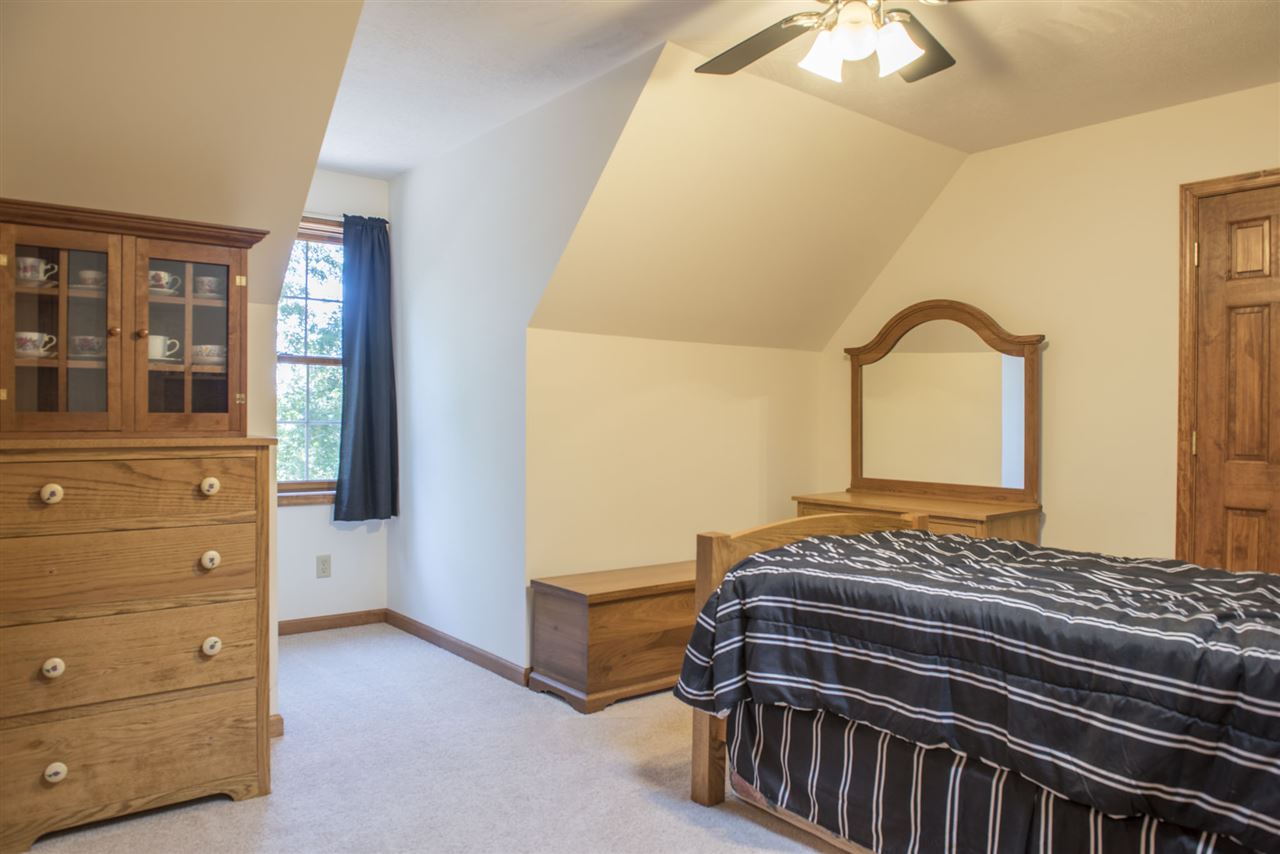 5979 Faughts Road Mount Crawford, VA 22841 - Photo 9 of 18 a bedroom with a bed and wooden floor