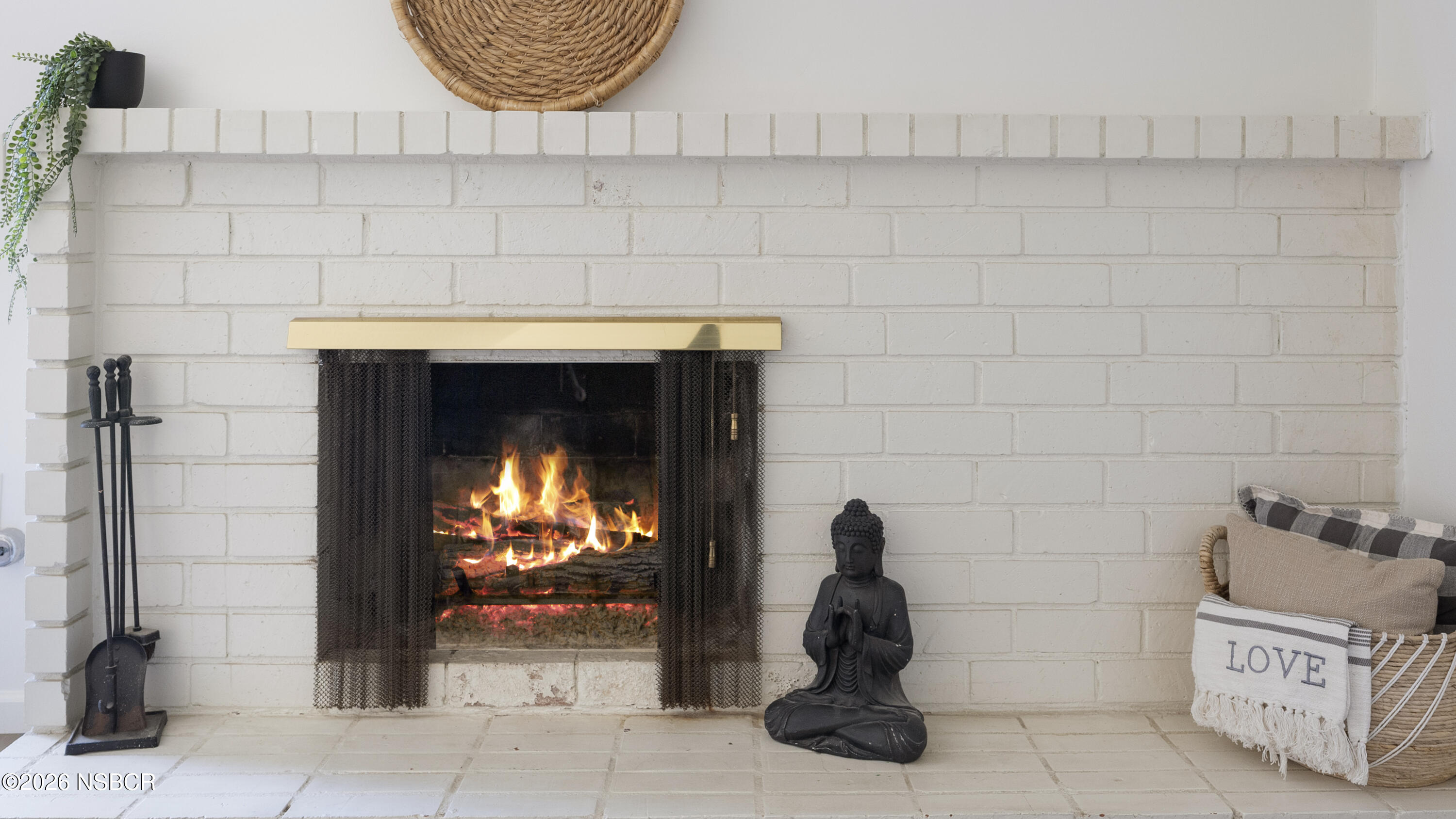 1312 North First Place Lompoc, CA 93436 - Photo 12 of 38 a close view of a fireplace in a room