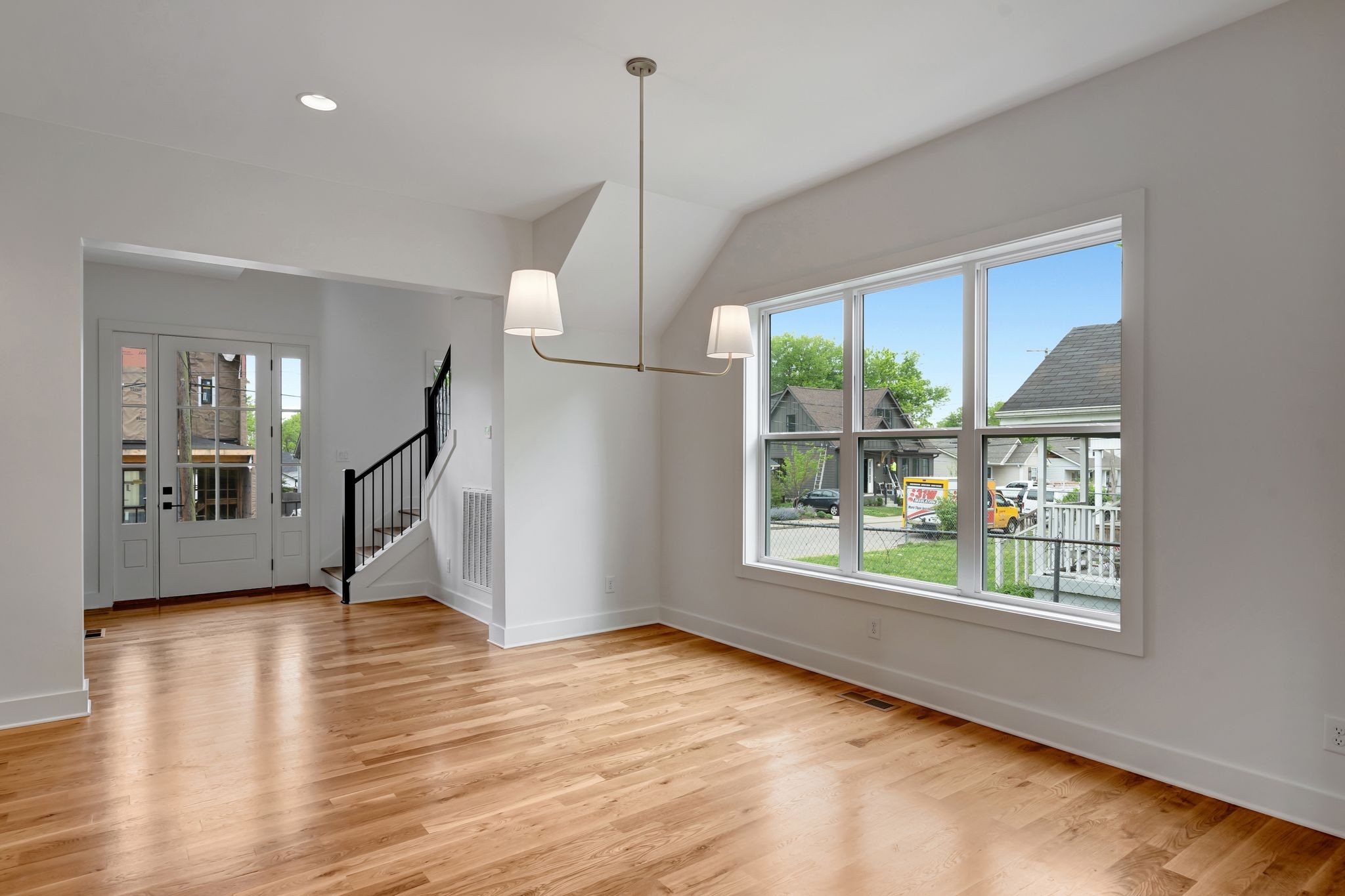 1826 Cephas Street Nashville, TN 37208 - Photo 11 of 35 a view of an empty room with wooden floor and a window