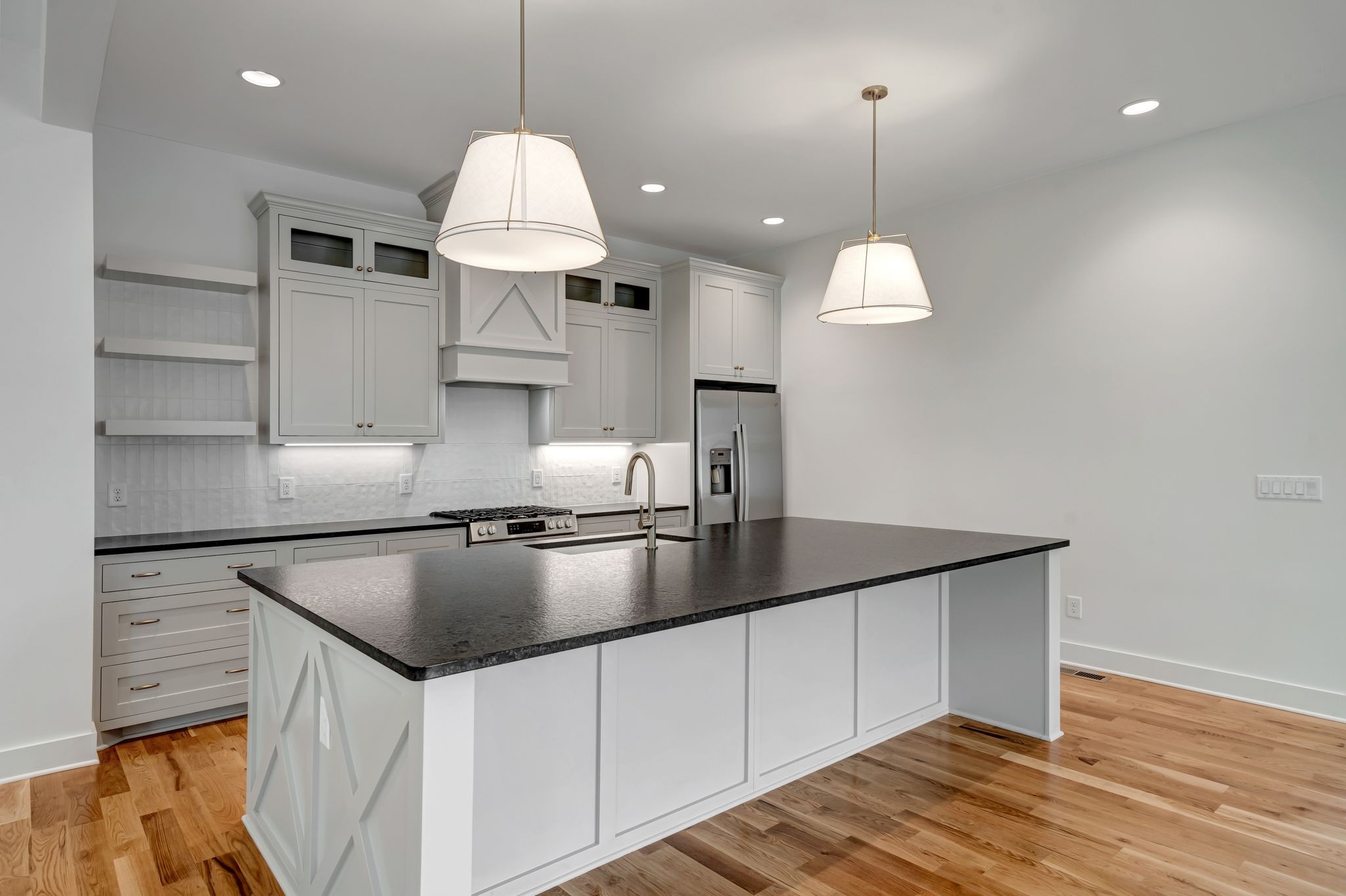 1826 Cephas Street Nashville, TN 37208 - Photo 14 of 35 a kitchen with kitchen island a counter space a sink and appliances