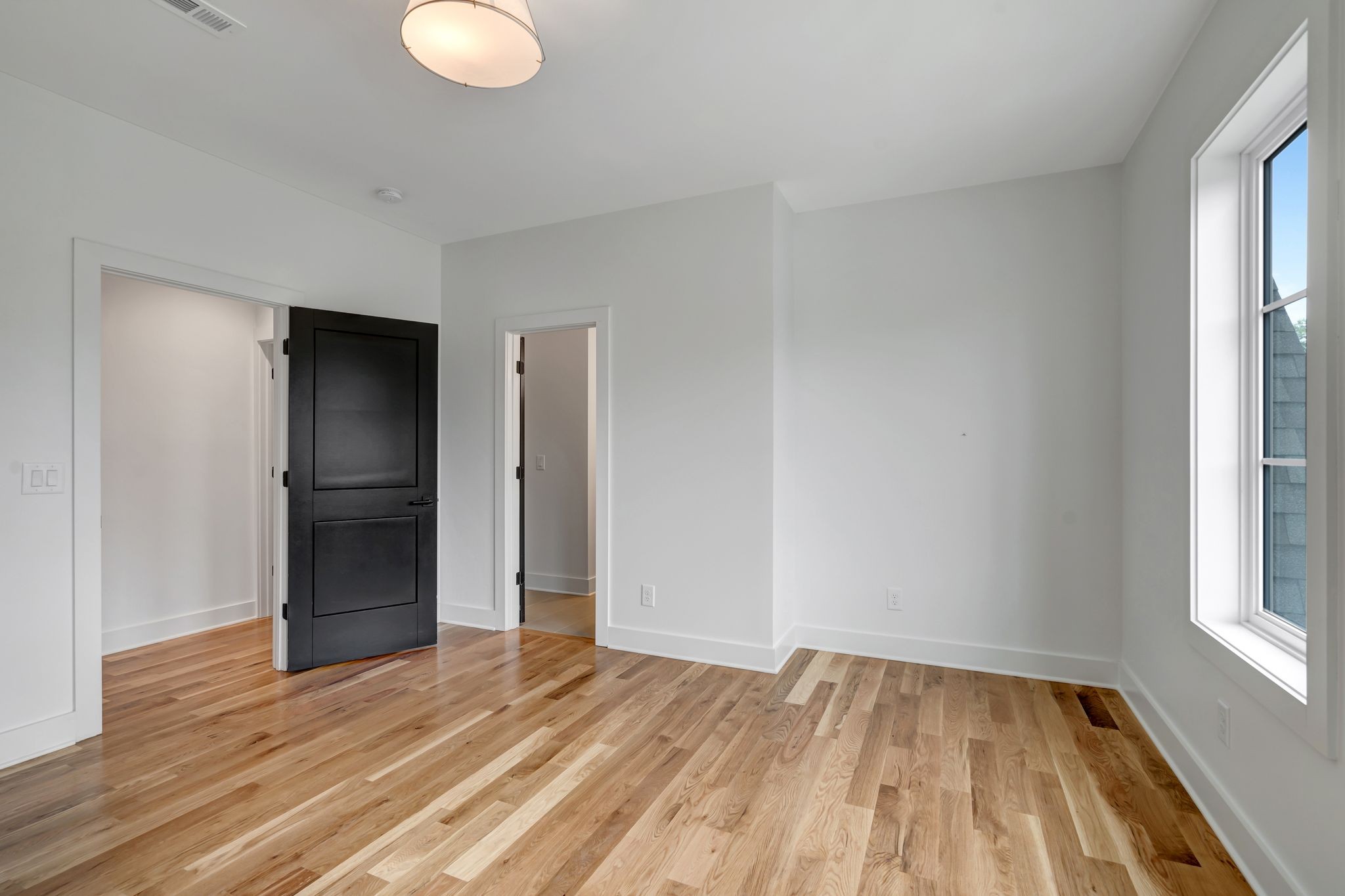1826 Cephas Street Nashville, TN 37208 - Photo 22 of 35 a view of empty room with wooden floor and fan