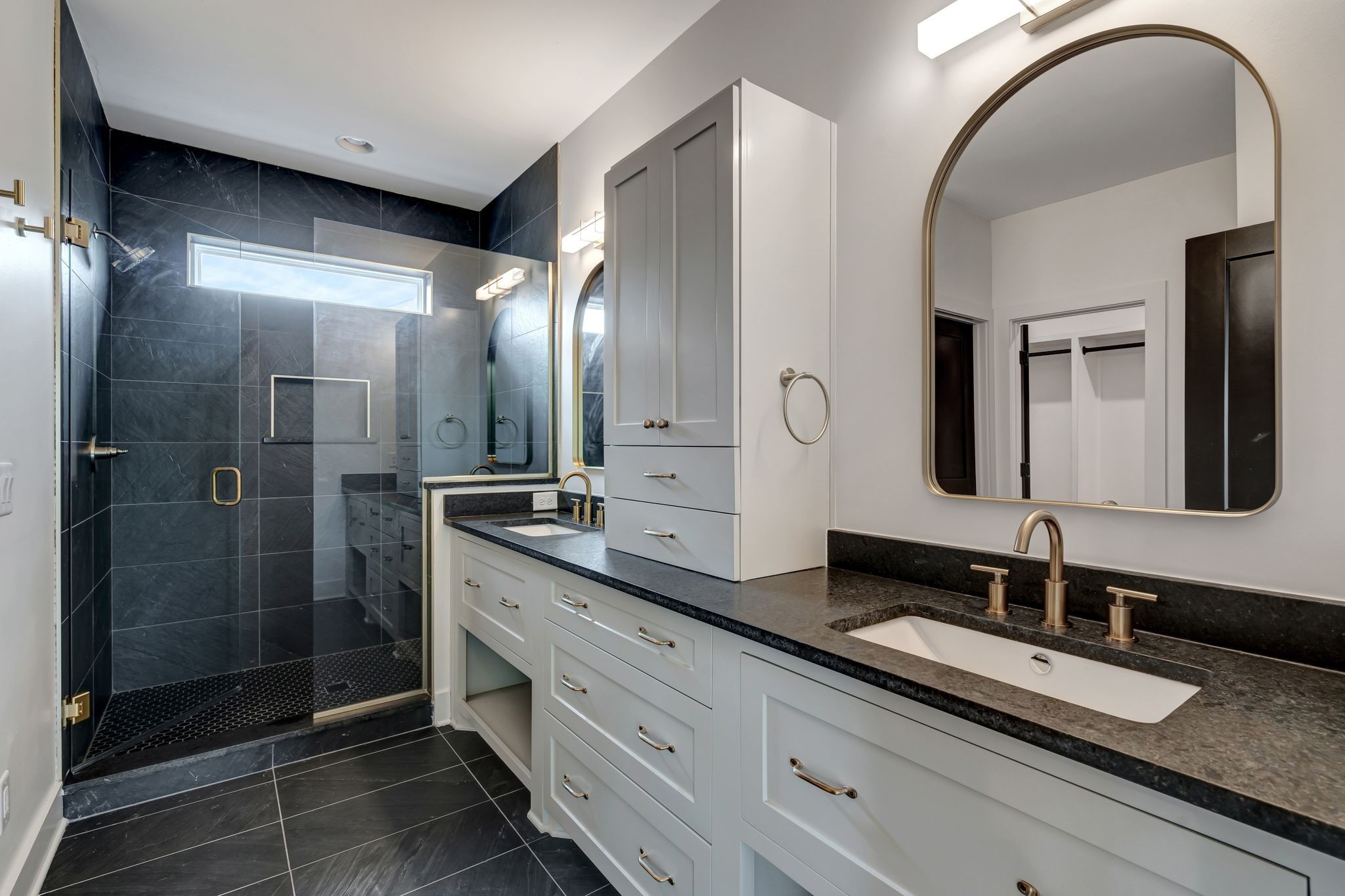 1826 Cephas Street Nashville, TN 37208 - Photo 30 of 35 a bathroom with a double vanity sink and a mirror