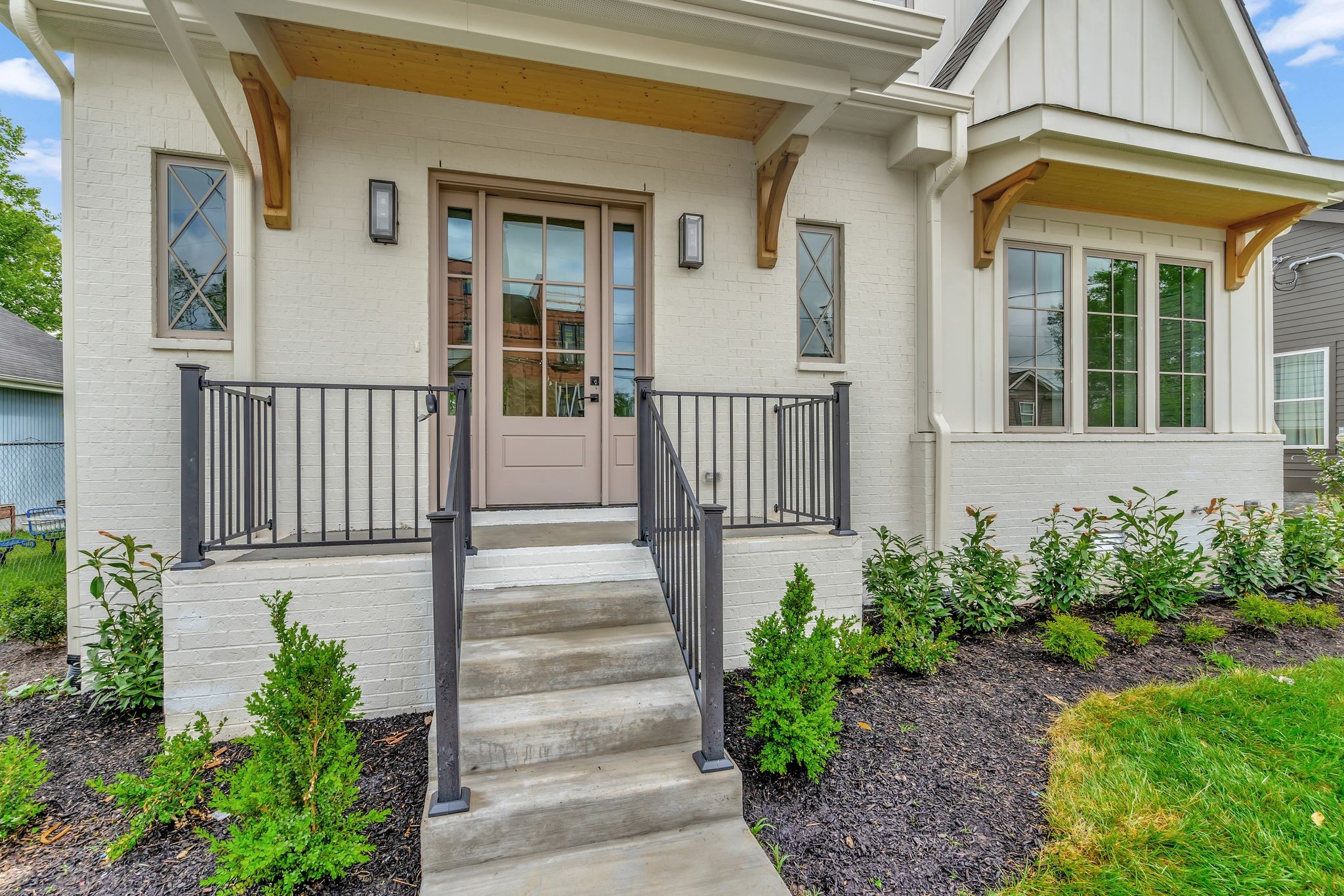 1826 Cephas Street Nashville, TN 37208 - Photo 3 of 35 a view of a house with a small yard plants and wooden floor
