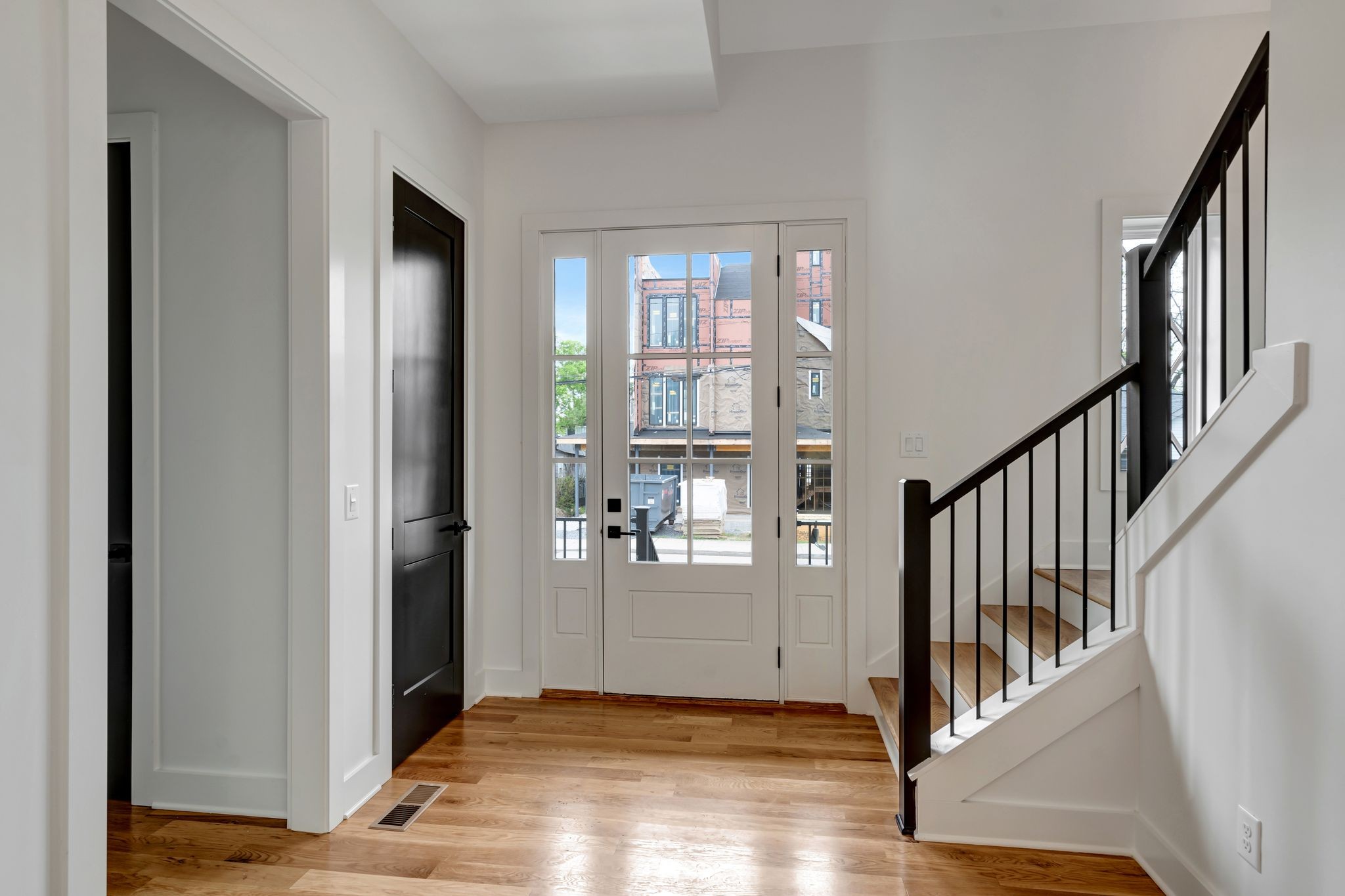 1826 Cephas Street Nashville, TN 37208 - Photo 5 of 35 a view of an entryway with wooden floor and door