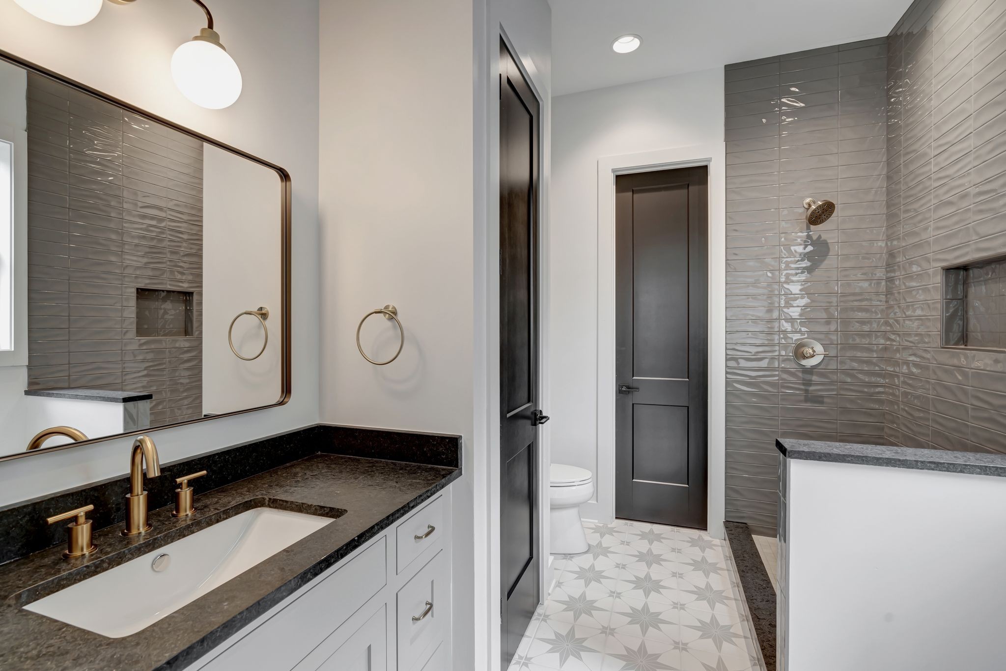 1826 Cephas Street Nashville, TN 37208 - Photo 9 of 35 a spacious bathroom with a granite countertop sink and a mirror