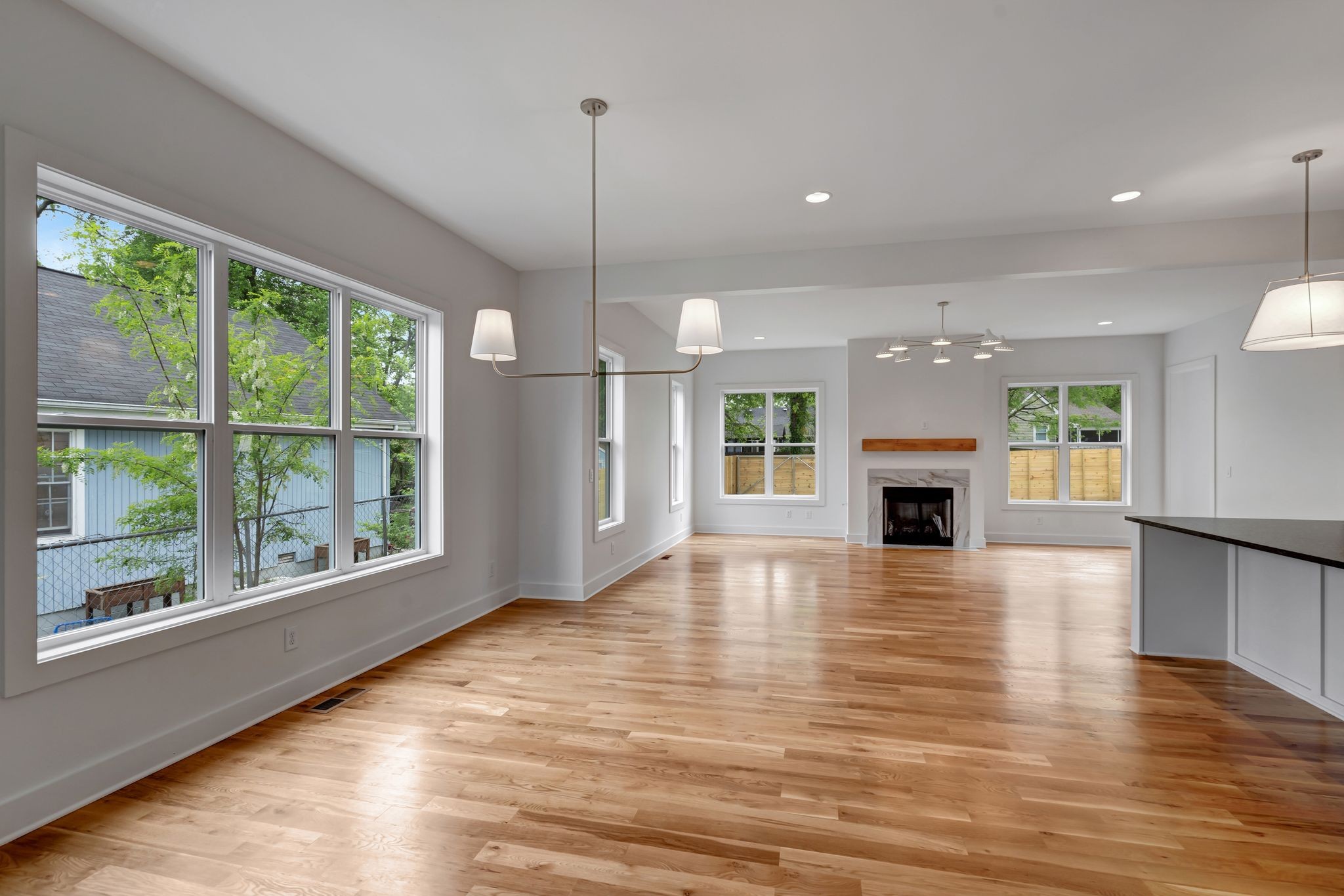 1826 Cephas Street Nashville, TN 37208 - Photo 10 of 35 a view of an empty room with wooden floor and a window