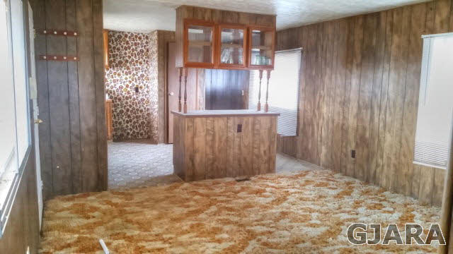 2234 H Road Grand Junction, CO 81505 - Photo 4 of 9 a view of an empty room with a bathroom and a window