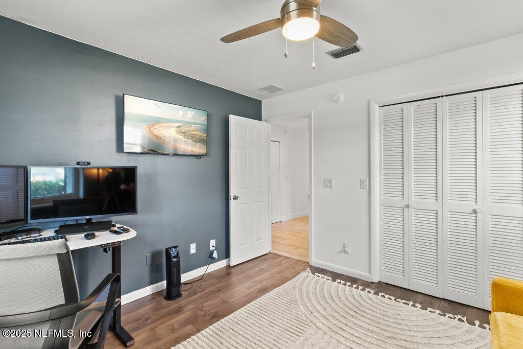 9480 Pickwick Drive Jacksonville, FL 32257 - Photo 26 of 43 a view of a livingroom with workspace and a window