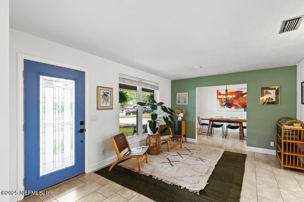 9480 Pickwick Drive Jacksonville, FL 32257 - Photo 3 of 43 a view of a livingroom with furniture and window