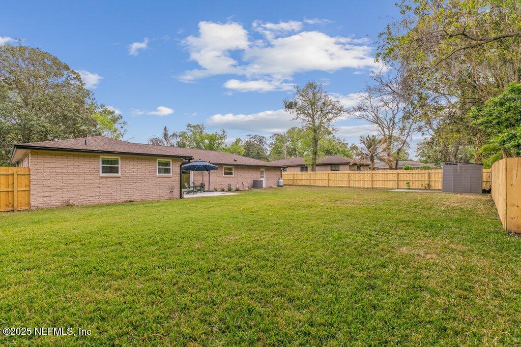 9480 Pickwick Drive Jacksonville, FL 32257 - Photo 38 of 43 a view of house with backyard