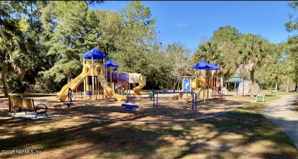 9480 Pickwick Drive Jacksonville, FL 32257 - Photo 40 of 43 a view of a park with swings and slides