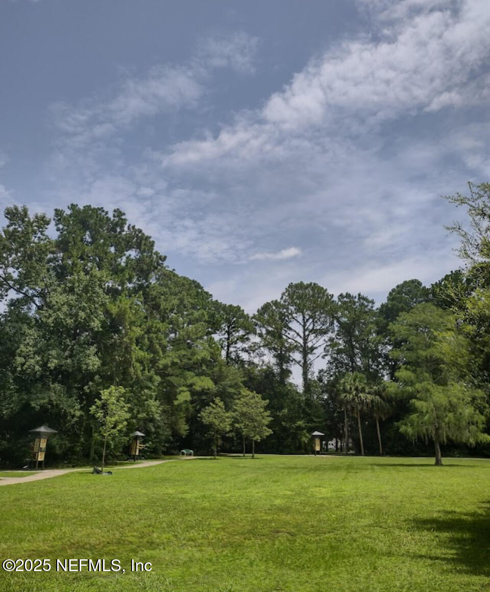 9480 Pickwick Drive Jacksonville, FL 32257 - Photo 42 of 43 a view of a grassy field