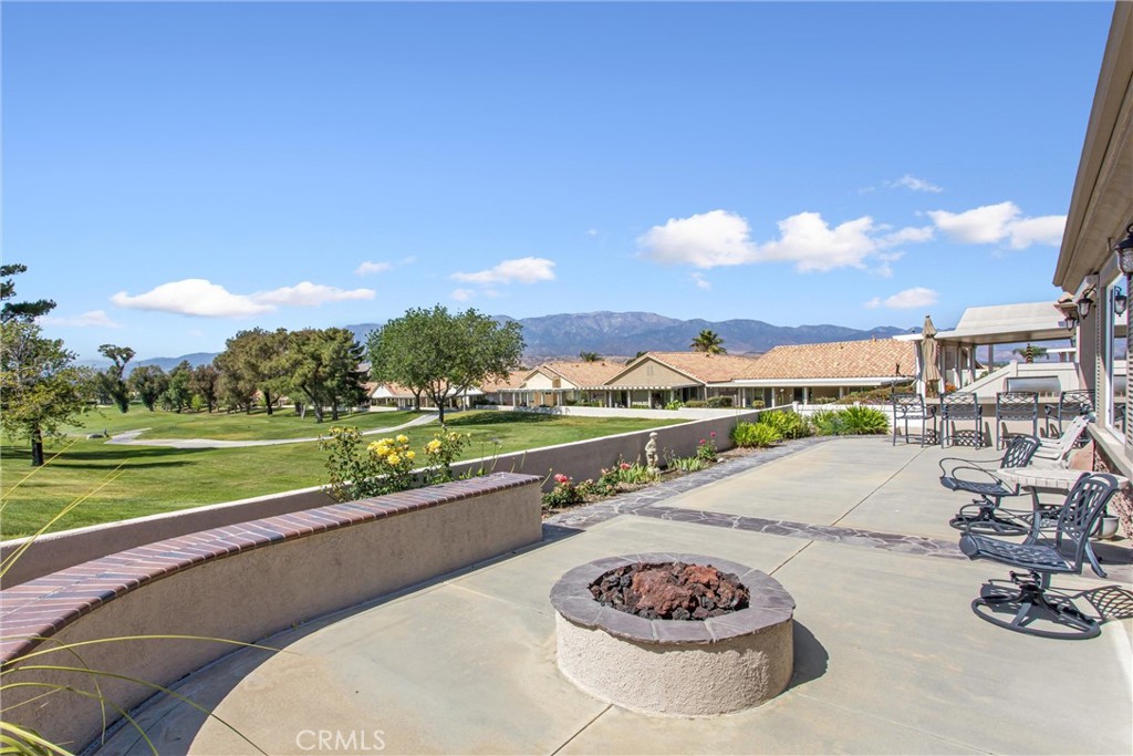 5233 Hampton Road Banning, CA 92220 - Photo 28 of 46 a view of a swimming pool and a terrace