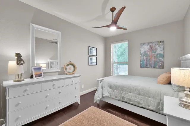 a spacious bathroom with a granite countertop sink mirror and a