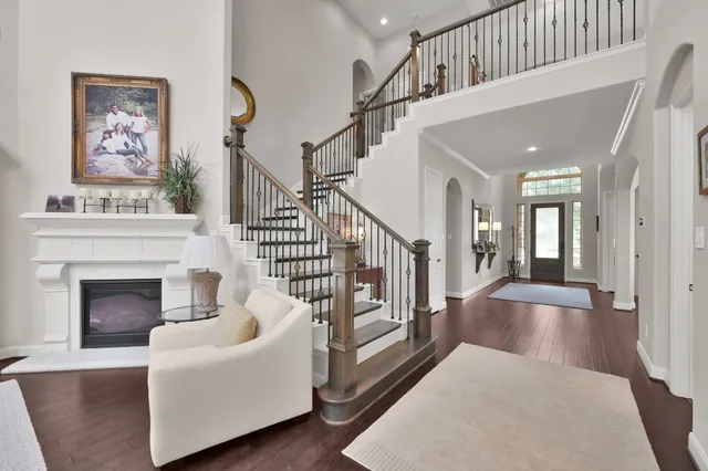 a bathroom with a granite countertop sink toilet and a mirror