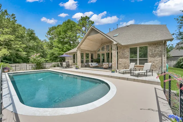 a view of a house with swimming pool