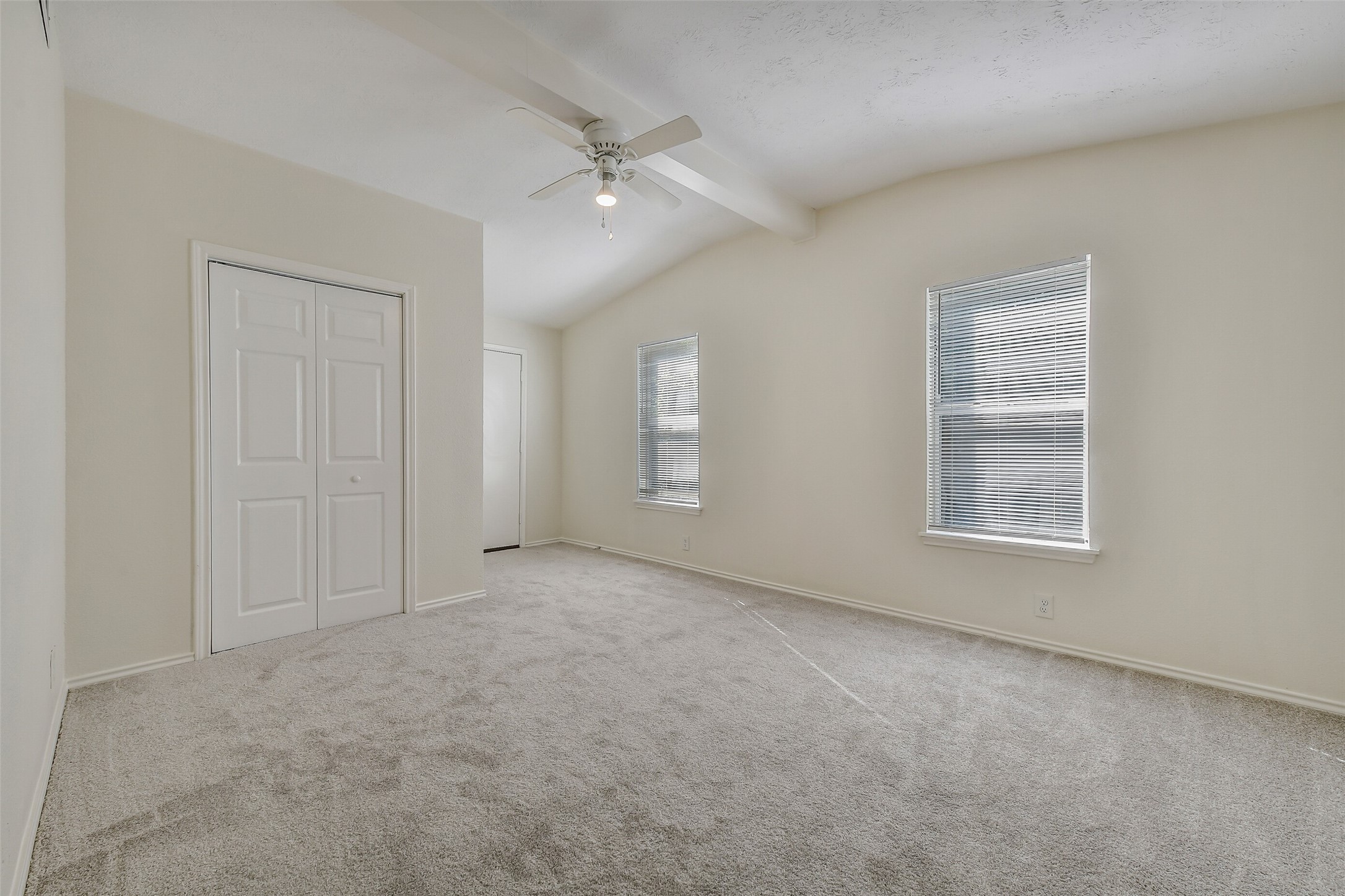 809 Chestnut Street La Marque, TX 77568 - Photo 12 of 25 Brand new for 2026 plush carpeting. The bi-fold door reveals a walk-in closet.