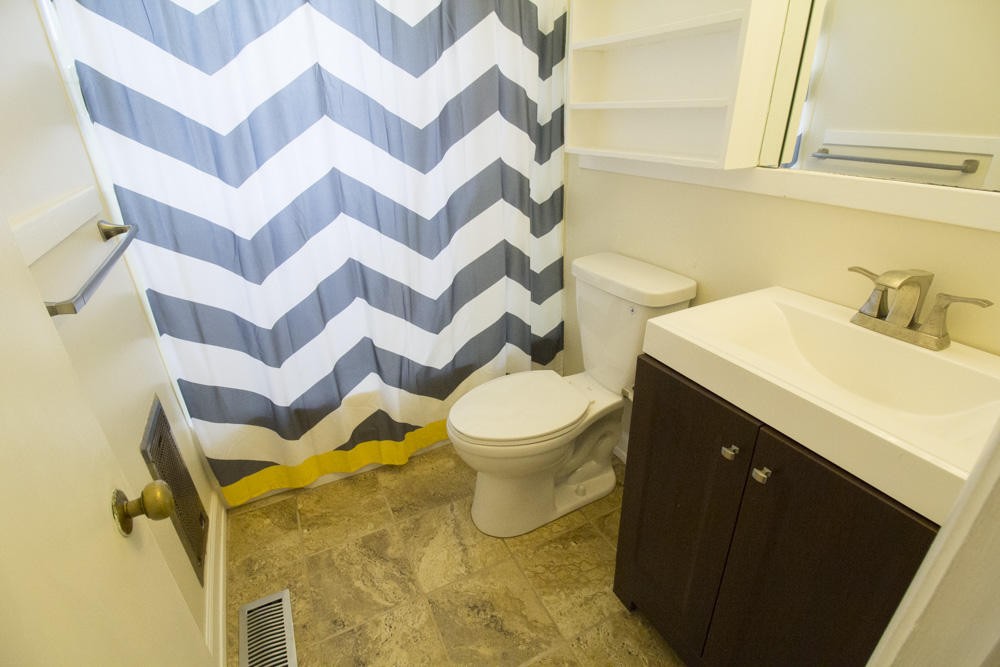 630 Robertsville Road Oak Ridge, TN 37830 - Photo 20 of 21 a bathroom with a sink and a mirror