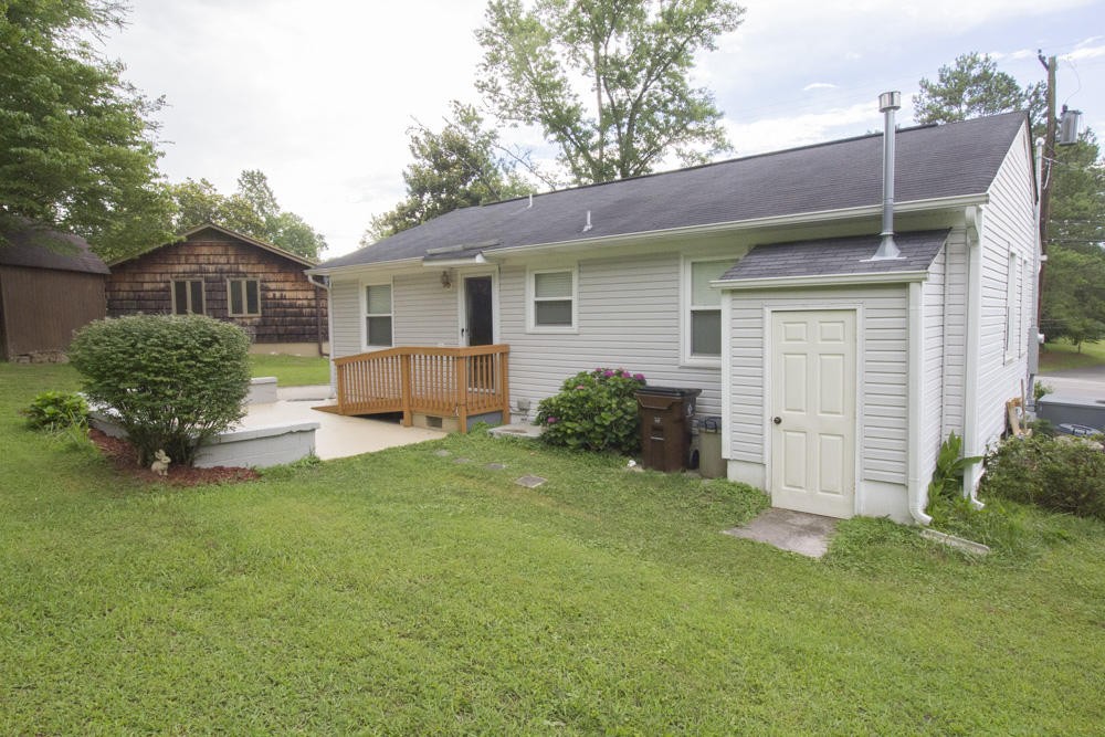 630 Robertsville Road Oak Ridge, TN 37830 - Photo 6 of 21 a front view of house with yard and green space
