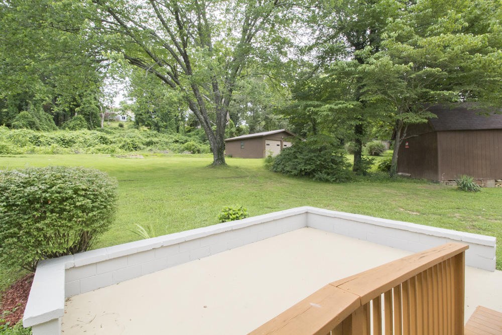 630 Robertsville Road Oak Ridge, TN 37830 - Photo 8 of 21 a view of a backyard with a large tree