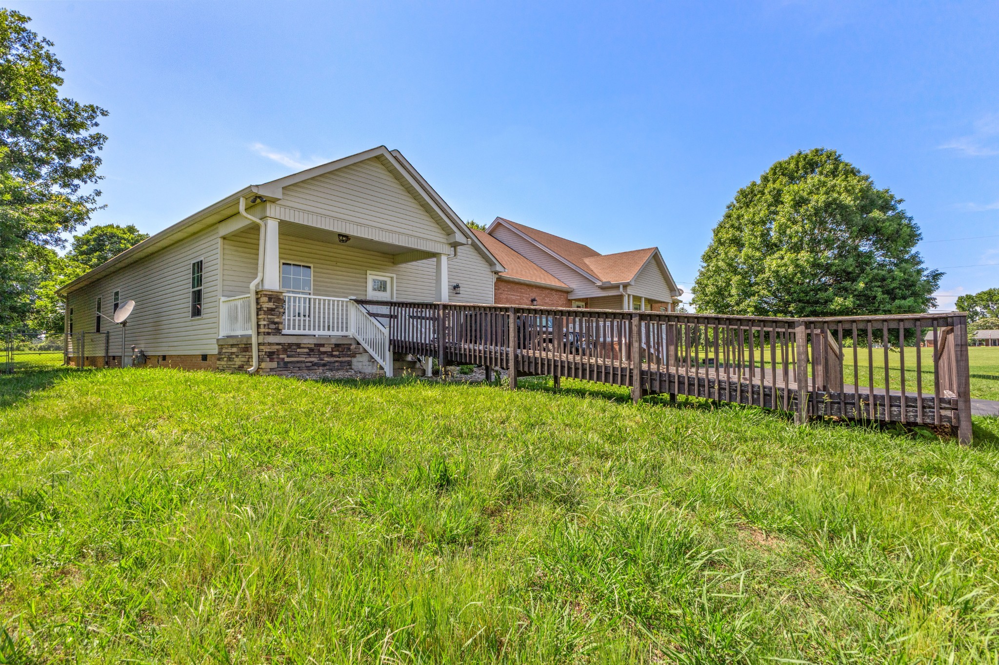 1010 Jacob's Valley Road Joelton, TN 37080 - Photo 20 of 33 a view of a house with a yard and deck
