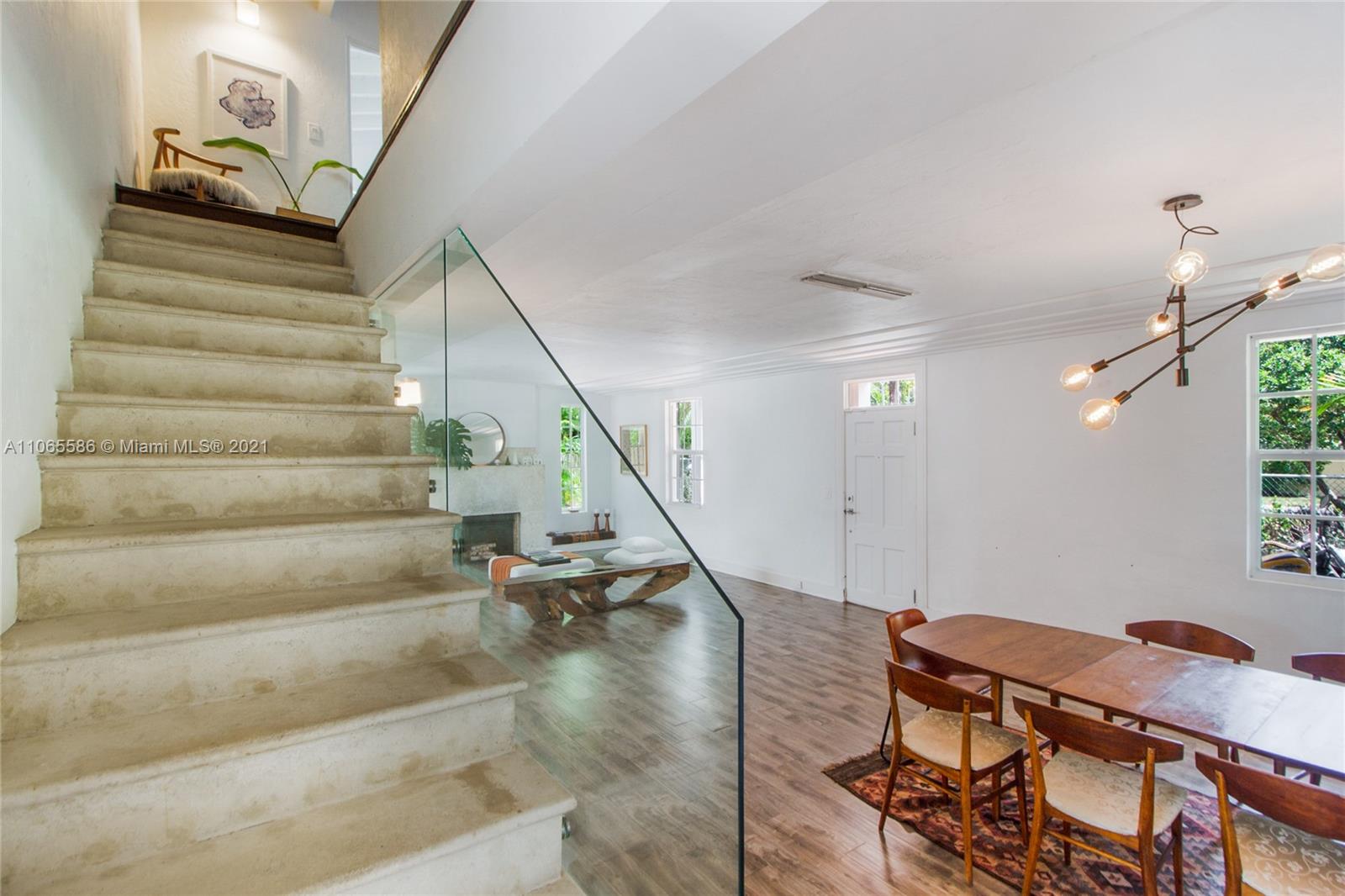 1701 Micanopy Avenue Miami, FL 33133 - Photo 21 of 40 a view of entryway and hall